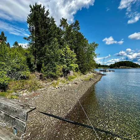 Waterfront House With Sun Day
