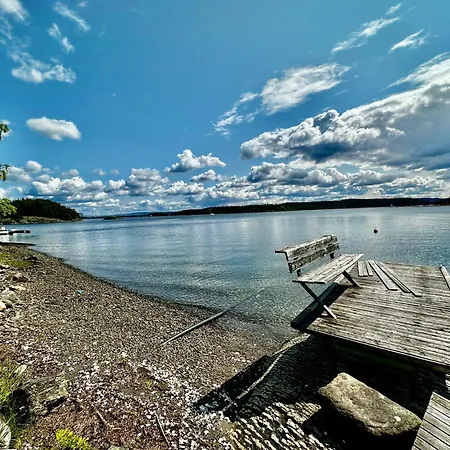 Waterfront House With Sun Day