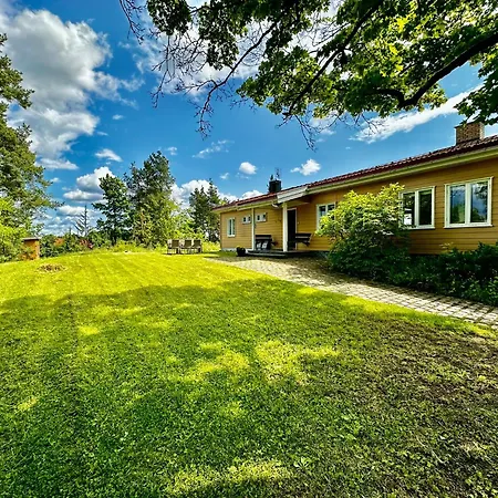 Waterfront House With Sun Day