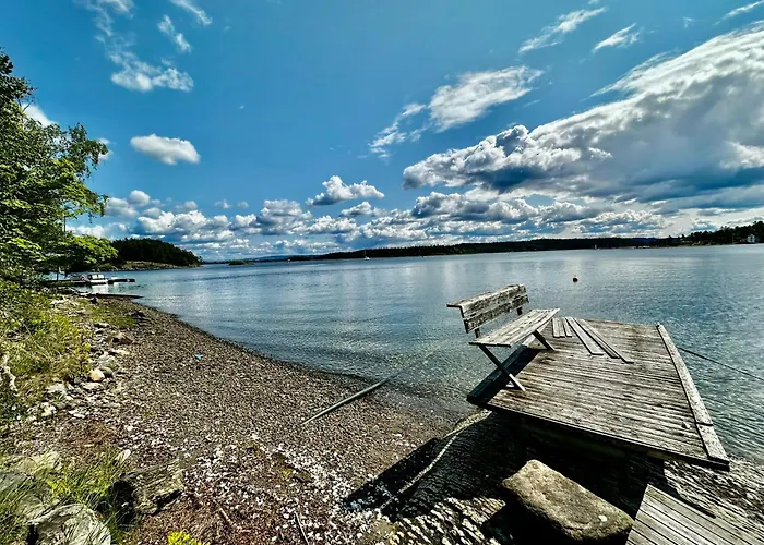 Waterfront House With Sun Day