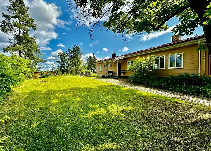 Waterfront House With Sun Day